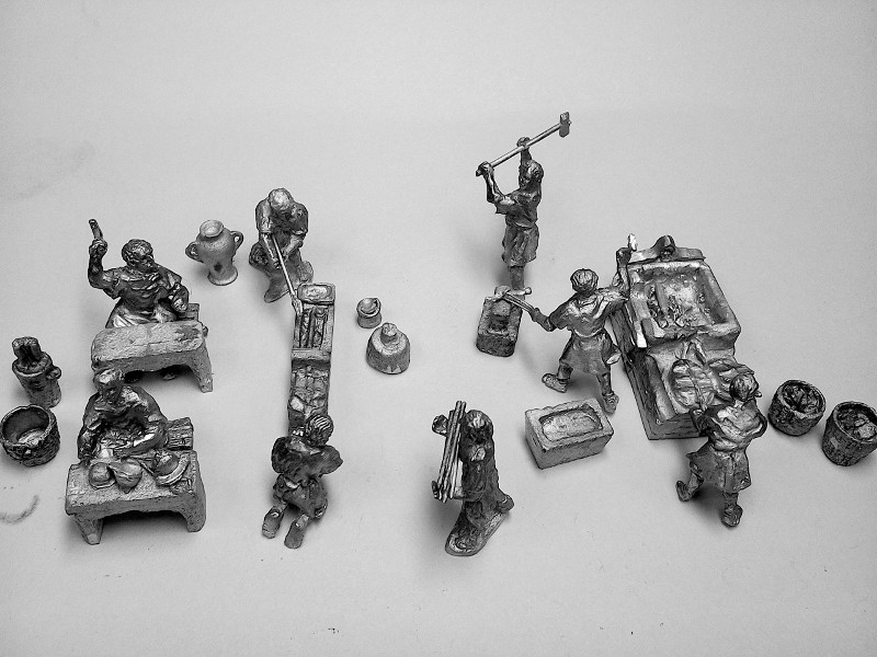 Römische Schmiede (Handwerker bei verschiedenen Tätigkeiten)